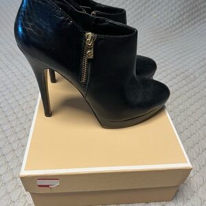 Michael Kors Black Leather Booties with Gold Tone Zipper
Priced to Sell!